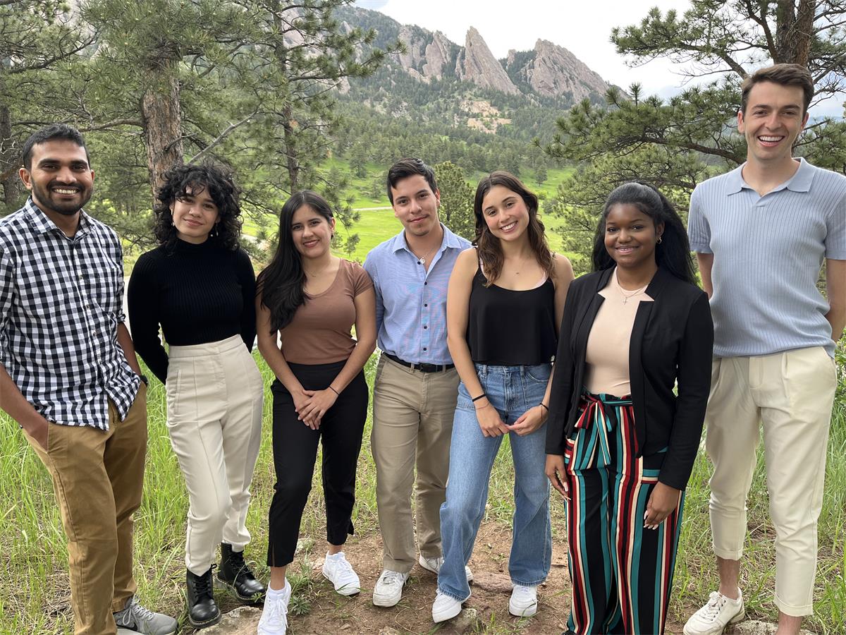 NESSI Interns from 2023 behind Boulder's flatirons
